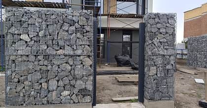 Установка забора габион из камня в сетке - цена под ключ Днепр. Фотография 1 Забор из габиона, камня в сетке - цена Днепр. Фото 1